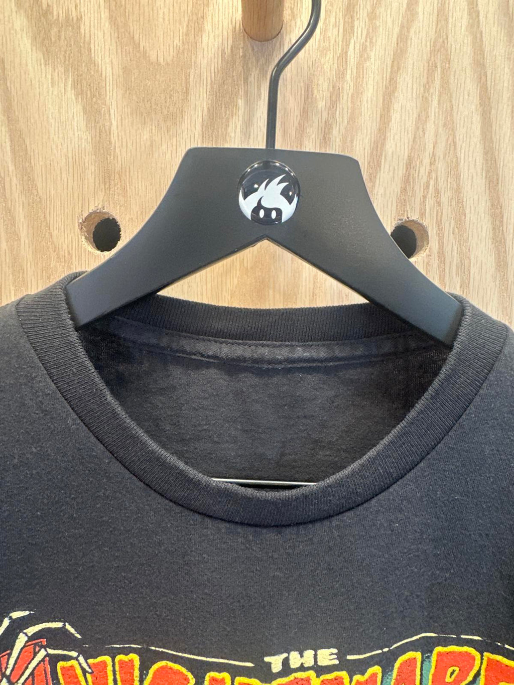 Black Graphic t-shirt featuring characters from The Nightmare Before Christmas.