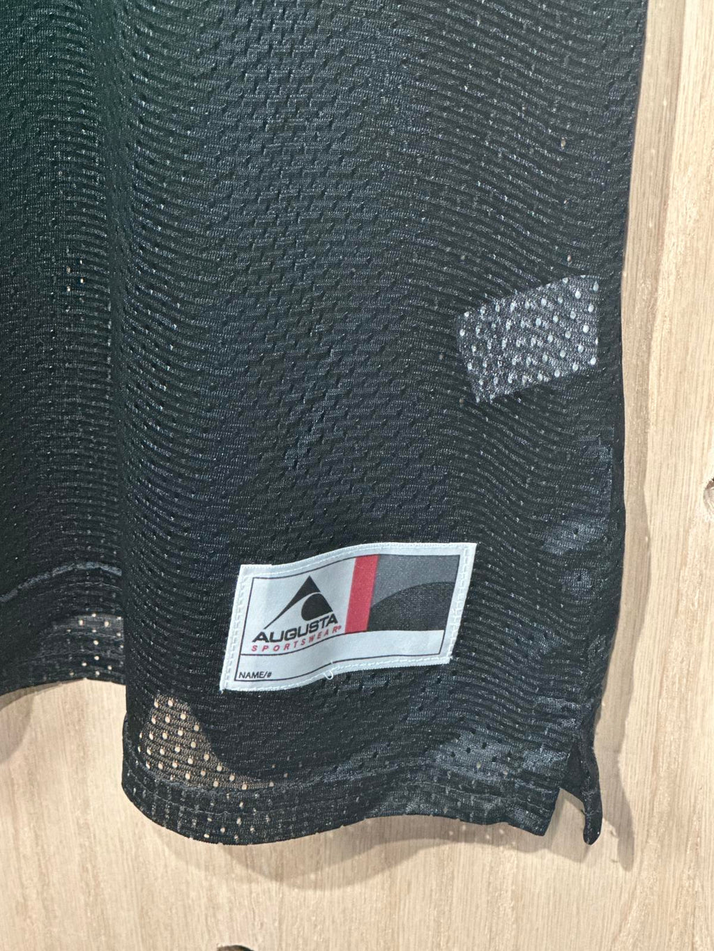 Woman's Black Athletic Jersey with Green Number 1